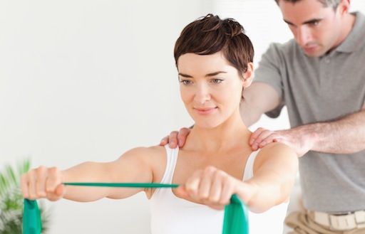 chiropractic doctor treating a young lady